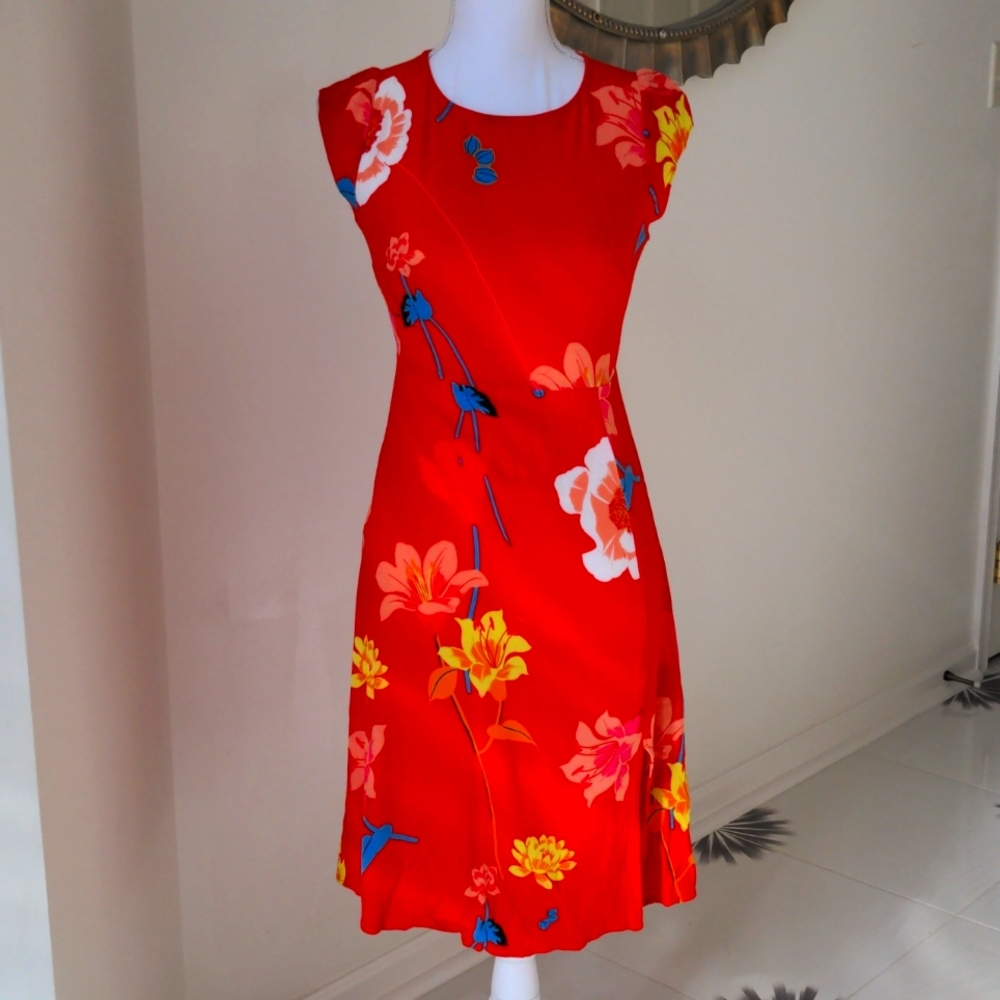 Size 00 petite vibrant orange, yellow, pink, and green floral Loft midi dress